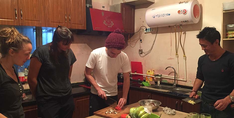 group choping at Tibetan family kitchen