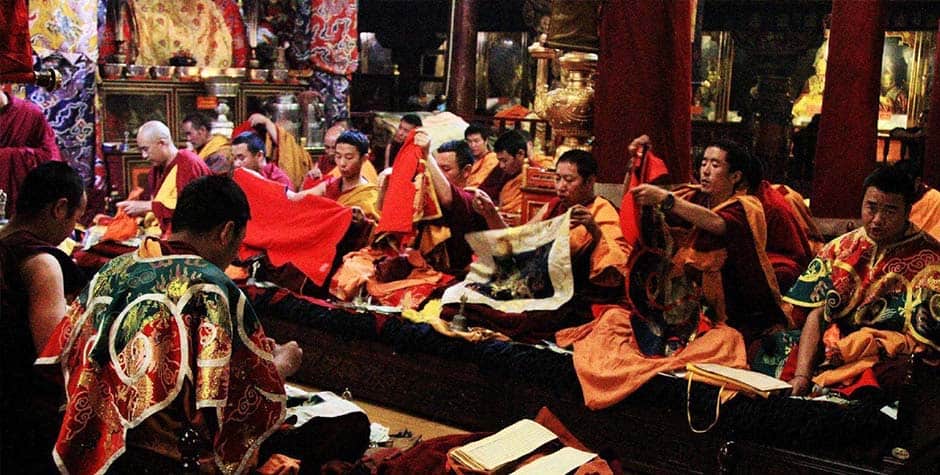 Monks during morning rituals on 15th day of saga dawa in jokhang temple