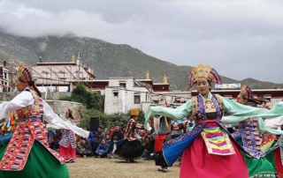 Ache Lhamo Dancing during tibetan opera performance in Drepung monastery